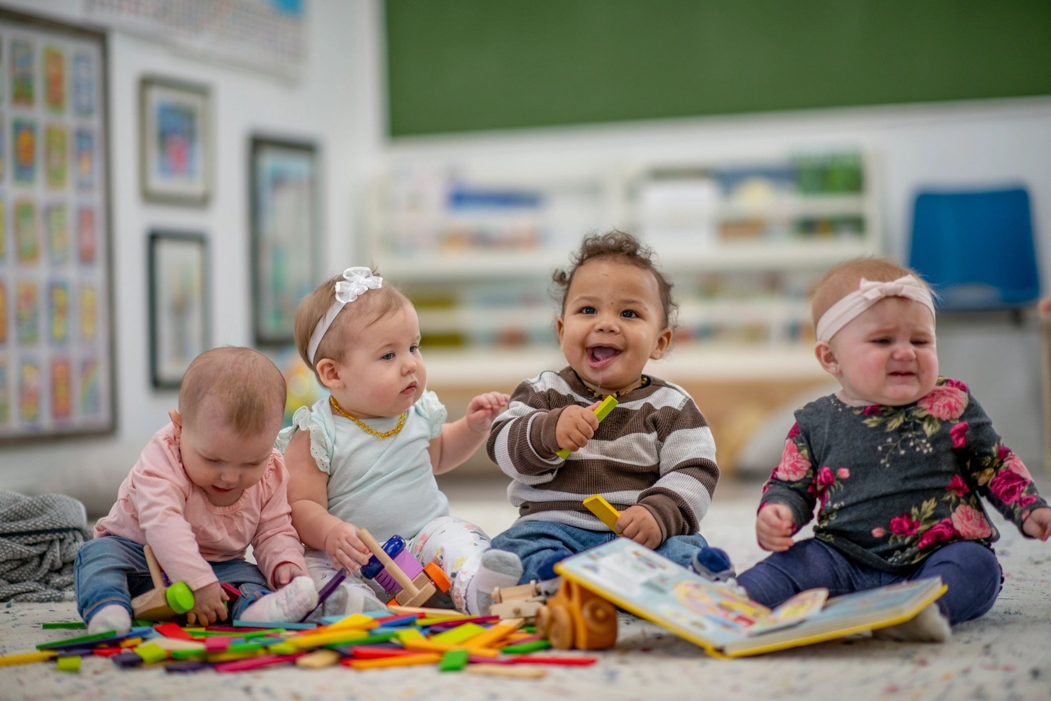 Preschool children engaged in classroom learning at Curie